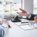 Consultation and conference of Male lawyers and professional businesswoman working and discussion having at law firm in office. Concepts of law, Judge gavel with scales of justice.